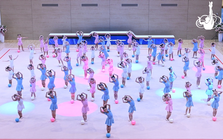 Young gymnasts performing at the opening ceremony of the all-Russian Sky Grace Cup competition