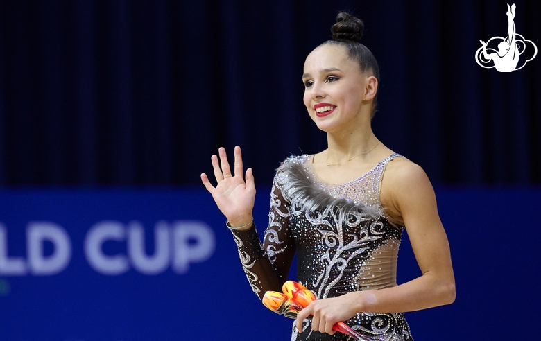 Mariia Borisova after an exercise with clubs