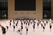 Young gymnasts during rehearsal of the competition opening