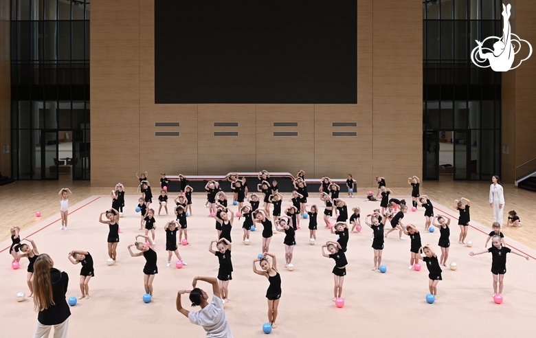 Young gymnasts during rehearsal of the competition opening