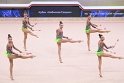 Gymnasts during an exercise with clubs