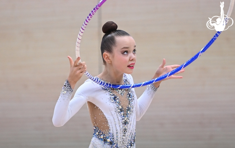 Gymnast during an exercise with a hoop