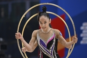 Gymnasts perform exercises with hoops during floor testing before the BRICS Games