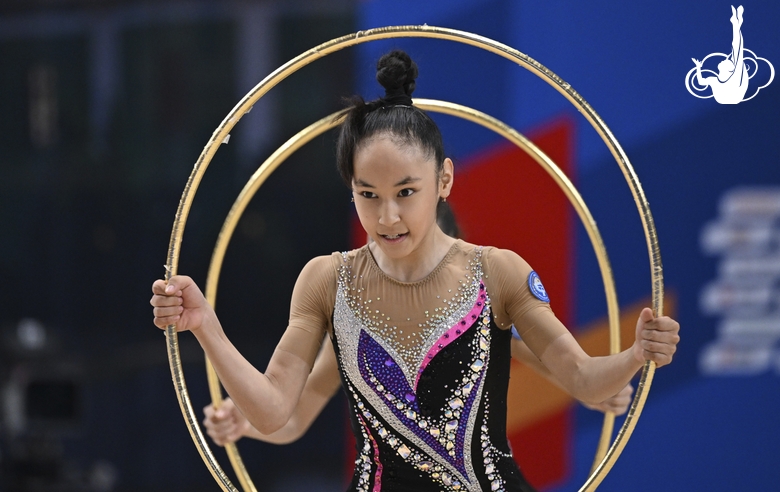 Gymnasts perform exercises with hoops during floor testing before the BRICS Games