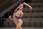 Anna Vakulenko during an exercise with clubs  during a control training session