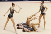 Gymnasts during an exercise with clubs