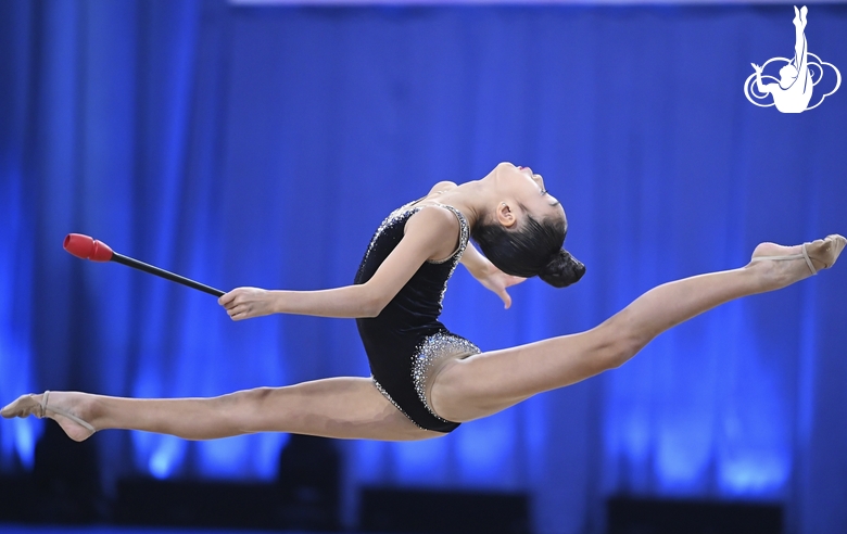 Asel Arapova during an exercise with clubs