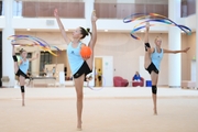 Gymnasts from the Khanty-Mansiysk Autonomous Okrug during an exercise with balls and ribbons