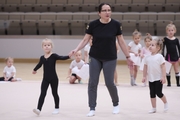 Academy Coach Alla Mishenina with young gymnasts during the selection