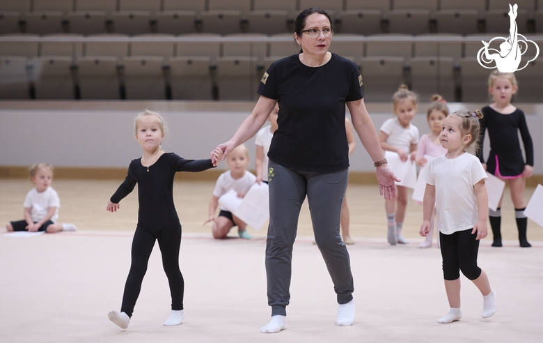 Academy Coach Alla Mishenina with young gymnasts during the selection