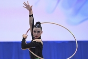 Lala Kramarenko during an exercise with a hoop