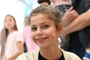 Academy student Karolina Tarasova in the face painting area