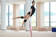 Gymnast during an exercise with a hoop