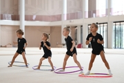 Young gymnasts during training
