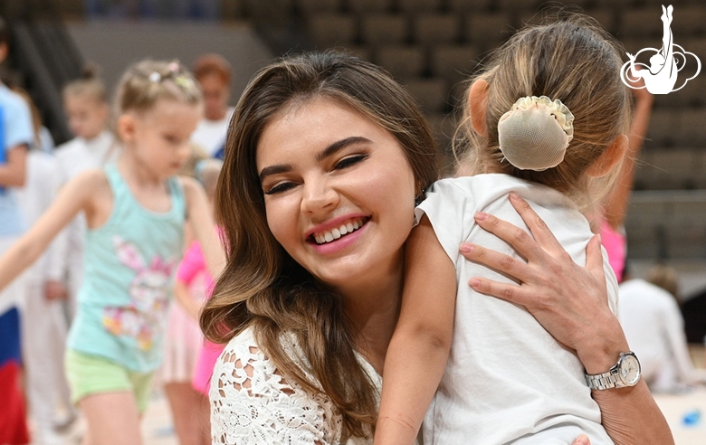 Olympic champion Alina Kabaeva with a young participant of the Academy selection process