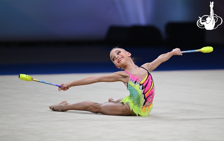 Vasilisa Botkina during the exercise with clubs