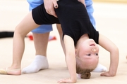 Young gymnast during training