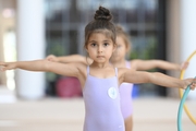 Young gymnast during training