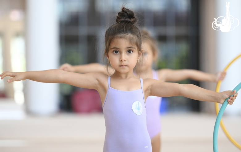 Young gymnast during training