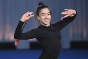 Manuela Gallego Henao during an exercise with clubs at floor testing