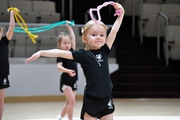 Young gymnast during training