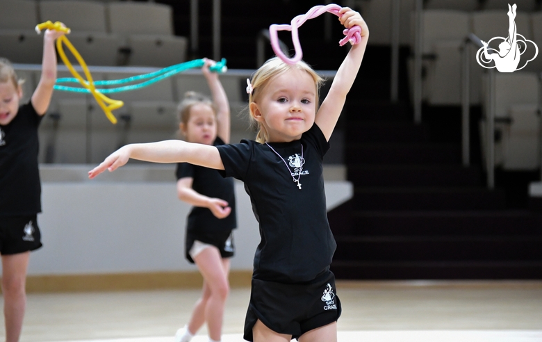 Young gymnast during training