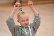 A young gymnast during a rhythmic gymnastics class