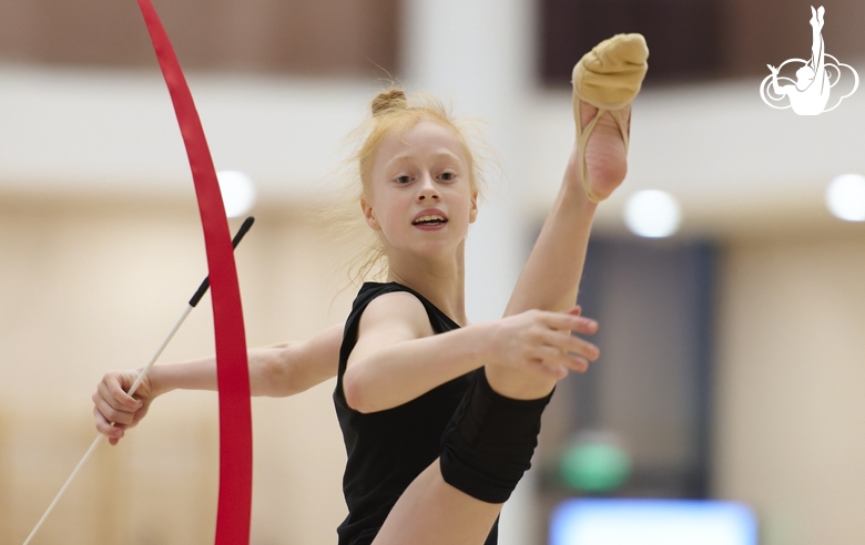 Olga Chernykh during an exercise with a ribbon