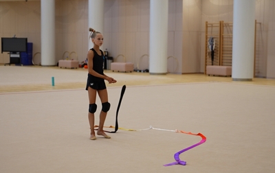 Alina Kabaeva and Evgenia Eliseeva work with Eva Kononova on accents