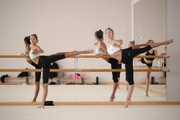 Gymnasts practice choreography during the recovery camp at the Academy