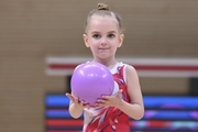 Young gymnast during an exercise with a ball at the mAlinka tournament