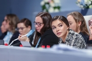 Olympic champion Alina Kabaeva watches the performances of the participants together with the judges