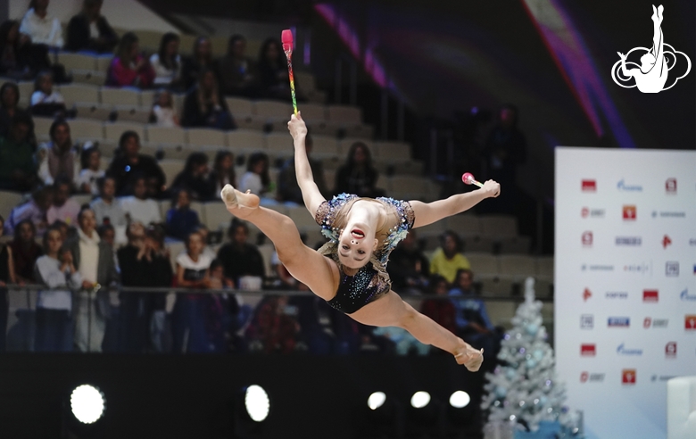 Natalia Usova (Uzbekistan) doing an exercise with clubs