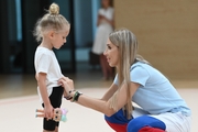 Academy Coach Olga Frolova with a young gymnast during the selection