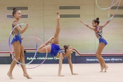 Gymnasts during an exercise with hoops