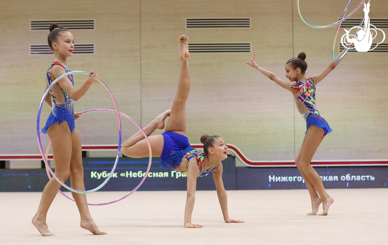 Gymnasts during an exercise with hoops