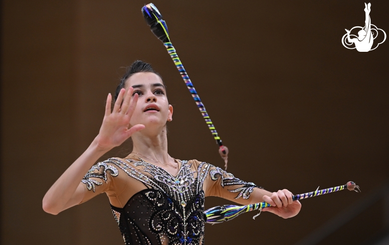 Anna Vakulenko during an exercise with clubs at an assessment training session