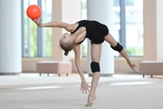 Kristina Voitenko during an exercise with a ball