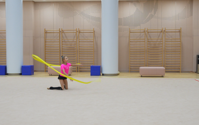 Olympic champion Alina Kabaeva works with Yana Zaikina on a clean performance of  her routine