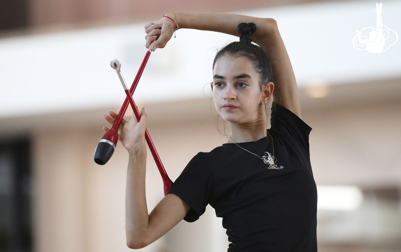 Anna Vakulenko during an exercise with clubs