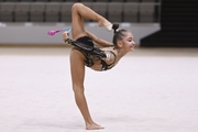 Ksenia Savinova  during an exercise with clubs at the control training session