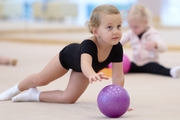 Young gymnasts during training