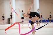 Kristina Voitenko during an exercise with a ribbon