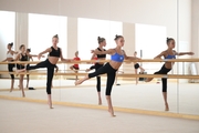 Gymnasts practice choreography during the recovery camp at the Academy