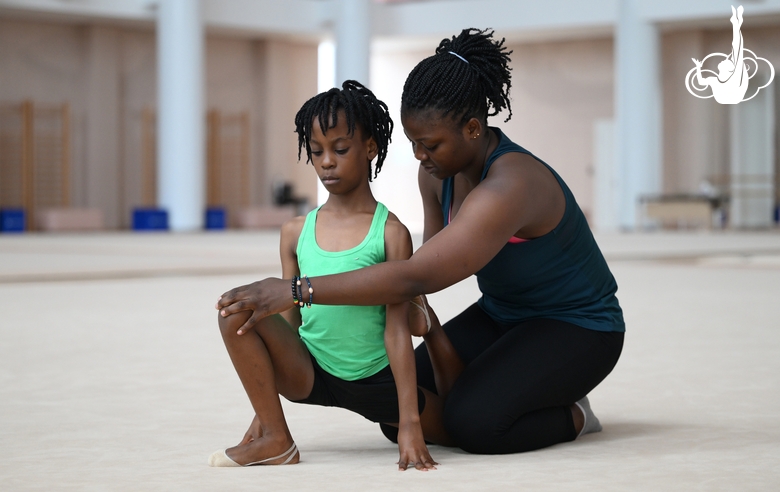 Gymnast from the Republic of Congo Nkenko Sita Davina Chanselvi together with coach Dominique Adama when stretching