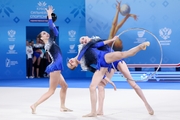 Национальная команда Республики Беларусь во время упражнения с обручами и мячами