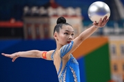 Gymnast during an exercise with a ball