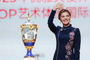November 17, 2025. Olympic champion Alina Kabaeva, President of the Sky Grace International Association, with the main trophy of the Sky Grace Cup International Tournament and Beijing Top Open 2025