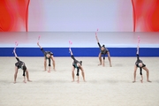 Group exercise gymnasts during the exercise with clubs