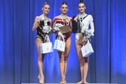 Mariia Borisova, Lala Kramarenko и Alina Harnasko at the awards ceremony